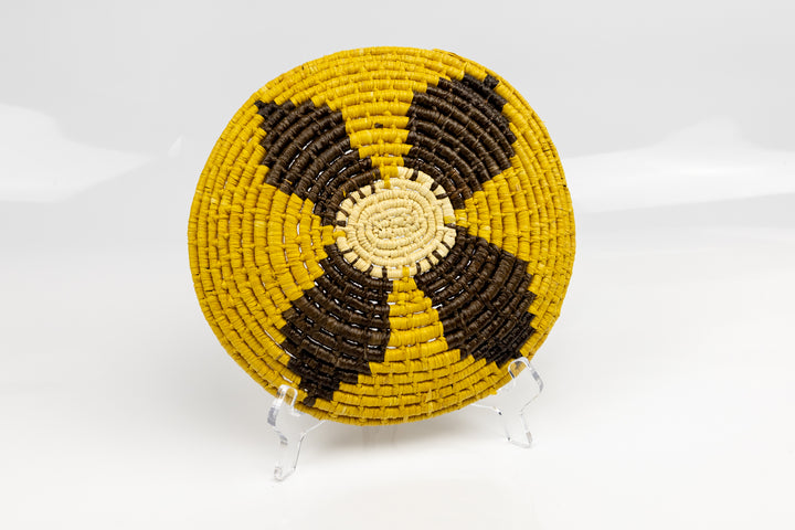 Gold, brown and white. Hand woven plate basket from Panama. Sambu village near Colombia.