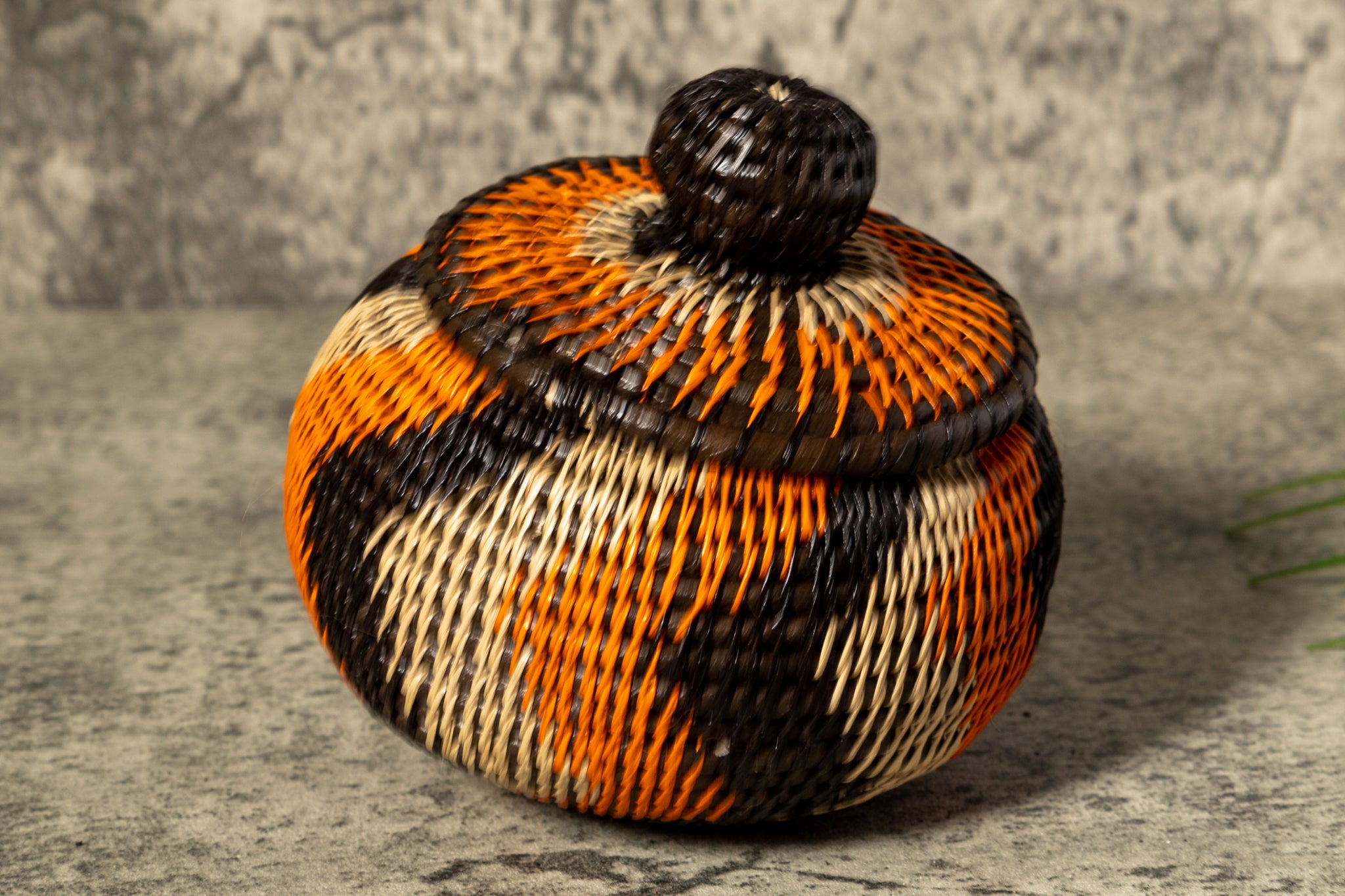 Orange Black And Gray Swirl Woven Basket With Top