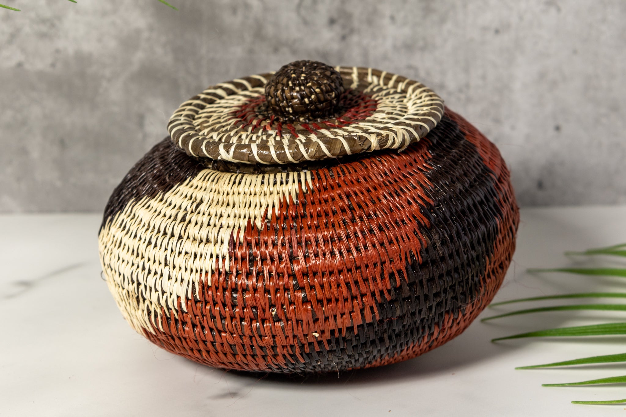 Brown White And Black Woven Basket With Top